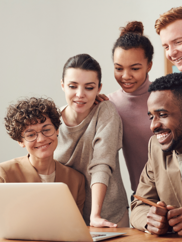 Digital marketing team analyzing performance metrics on laptop – Mohammed Qaiser Dubai”